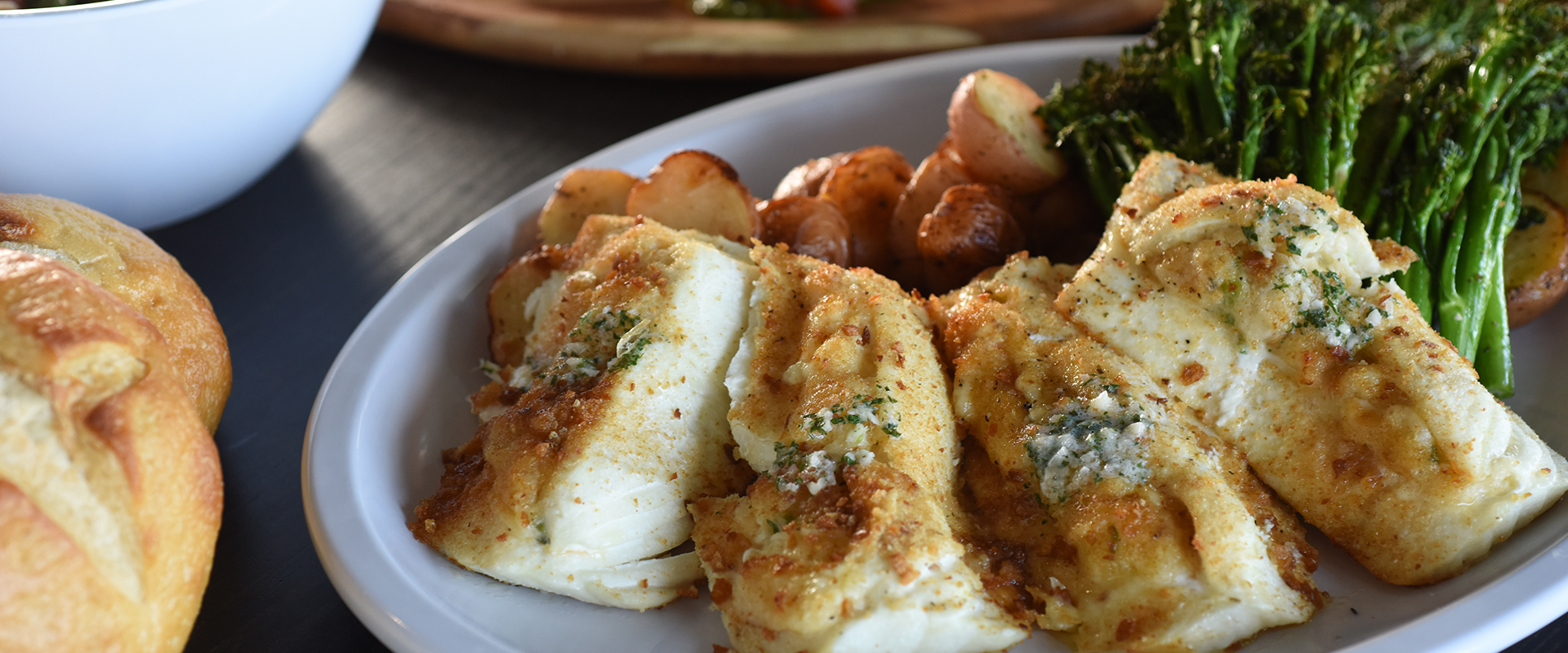 Dinner plate with halibut steaks, asparagus, and potatoes