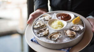 Duke's Seafood tray of oysters on the half shell resting over ice